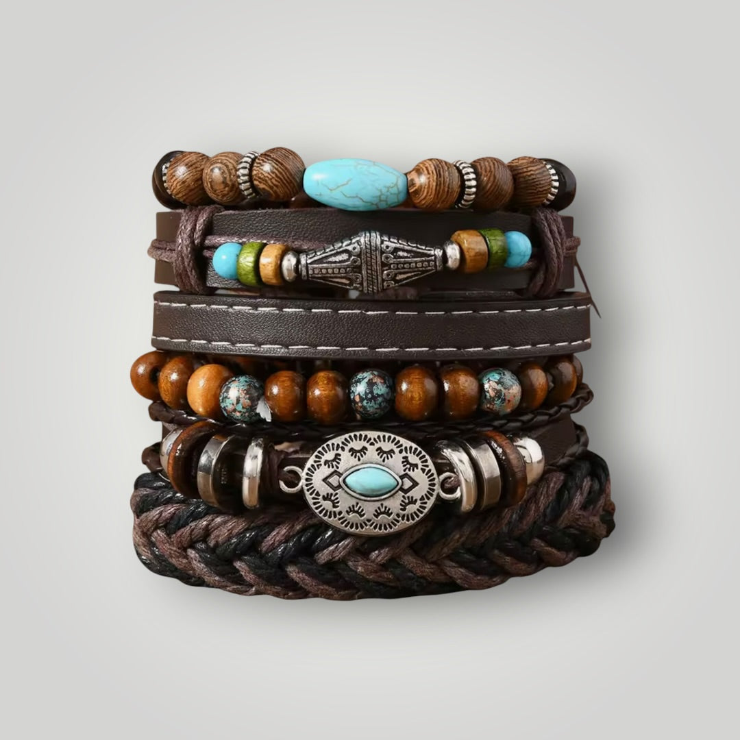 A stack of five western-style leather bracelets with wooden beads, turquoise accents, silver-toned metal spacers, and a braided leather base, photographed on a light gray background.
