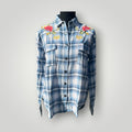 A blue and white plaid button-up shirt with red floral embroidery on the shoulders, displayed on a black mannequin torso against a light gray background.