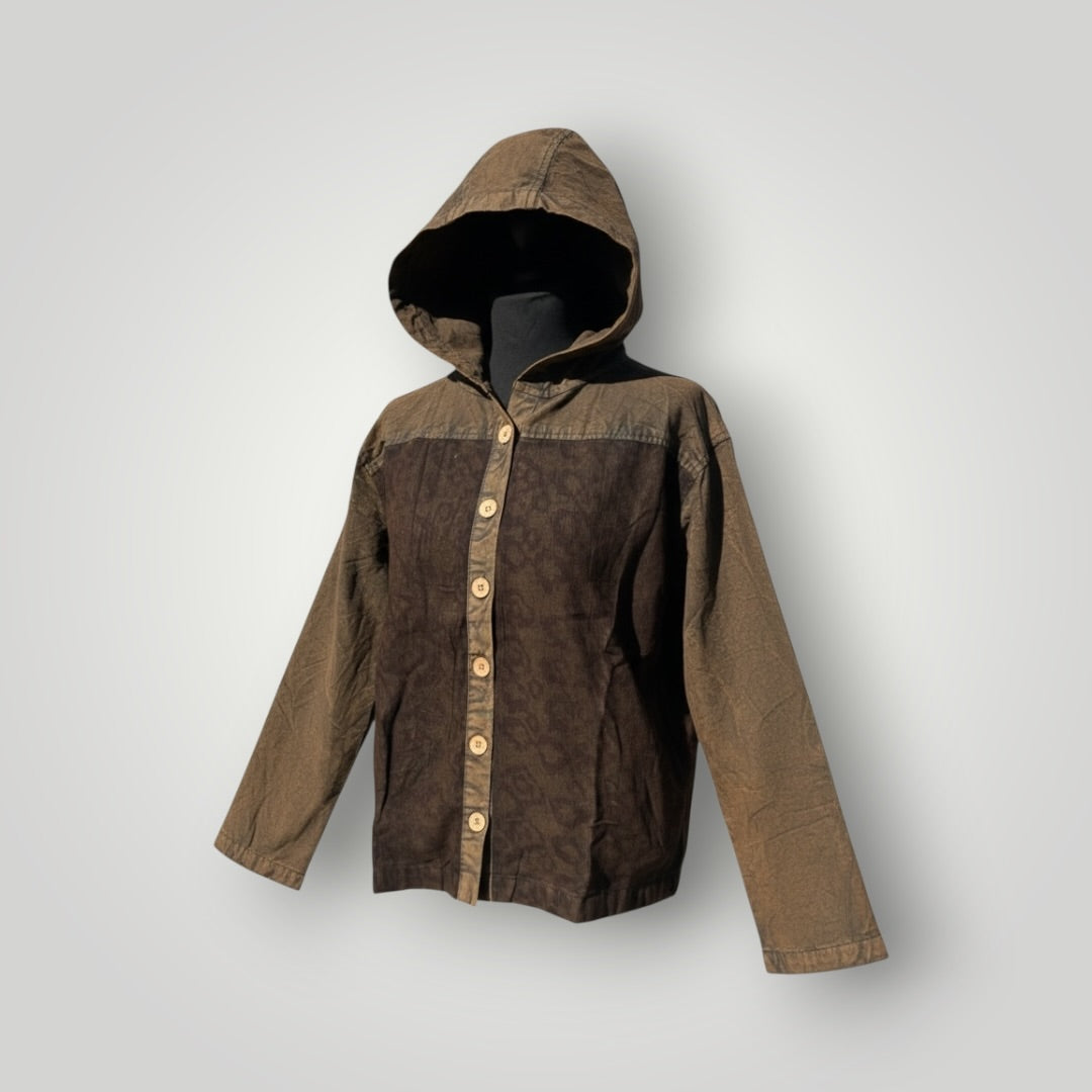 A hooded jacket displayed on a black mannequin torso against a light gray background. The jacket features a dark brown patterned front panel with a button closure and contrasting brown sleeves and hood.